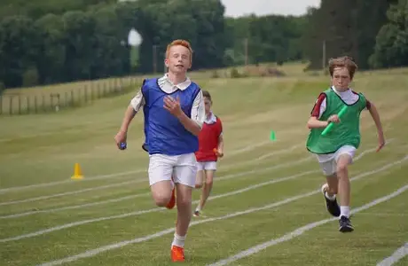 Rendcomb College pupils in relay race