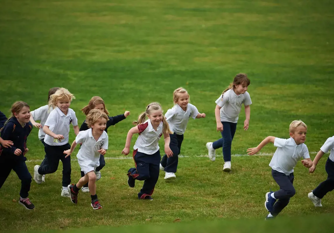 Rendcomb College Nursery children playing outside