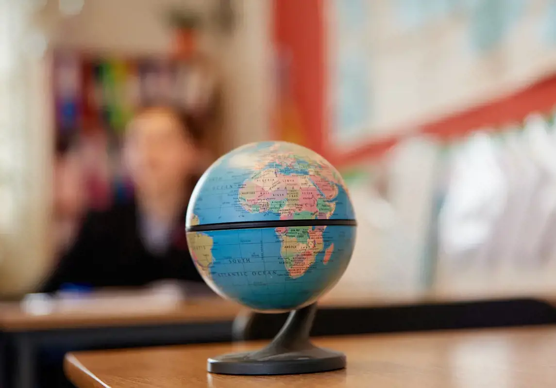 A globe in a classroom