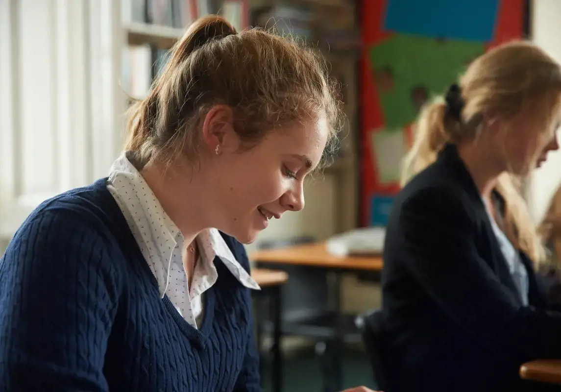 Pupil studying in class