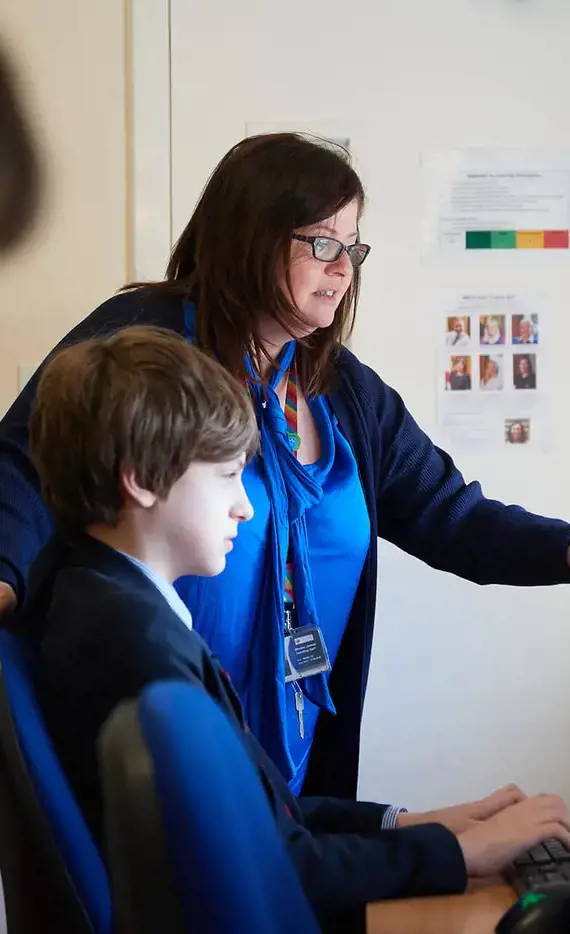 Rendcomb College teacher with student