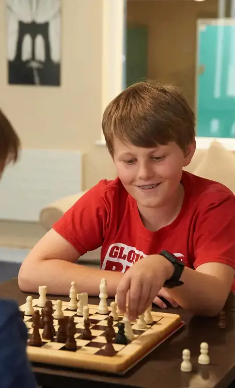 Rendcomb College boarders playing chess