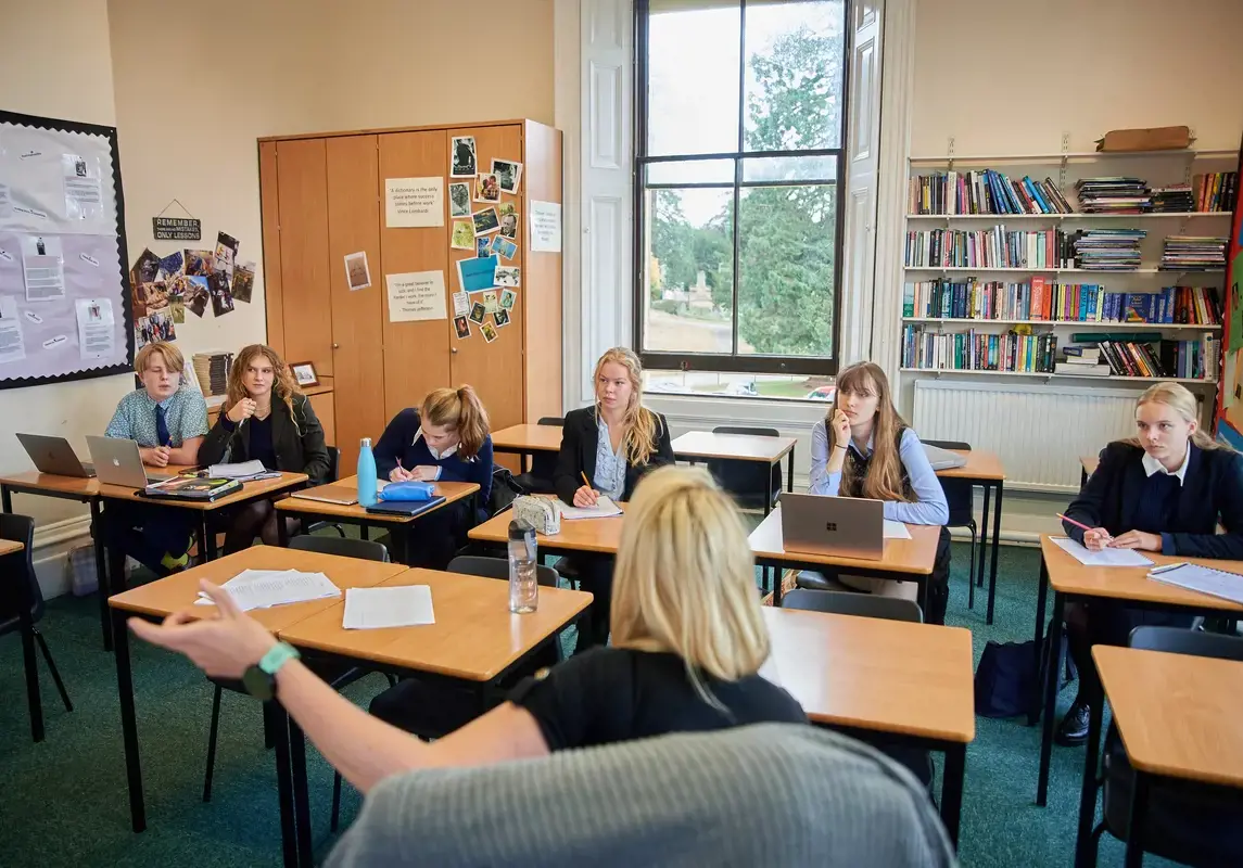 Pupils in class with teacher