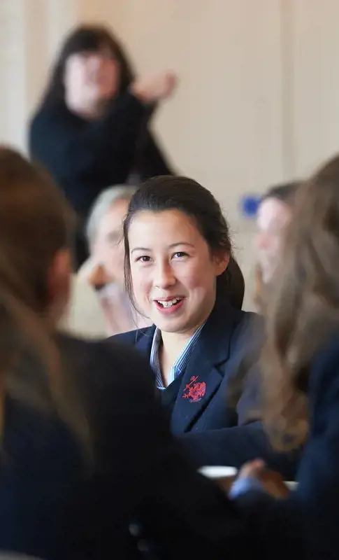 A happy pupil in class