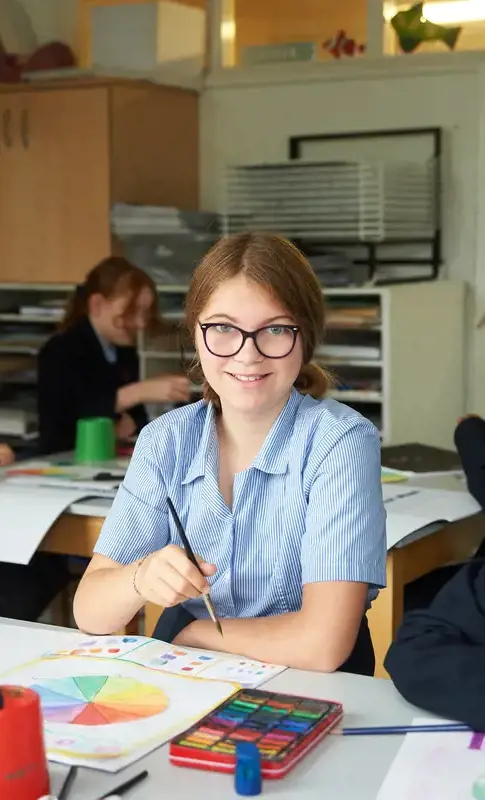 A happy pupil in class