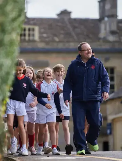 Rendcomb College teacher and pupils