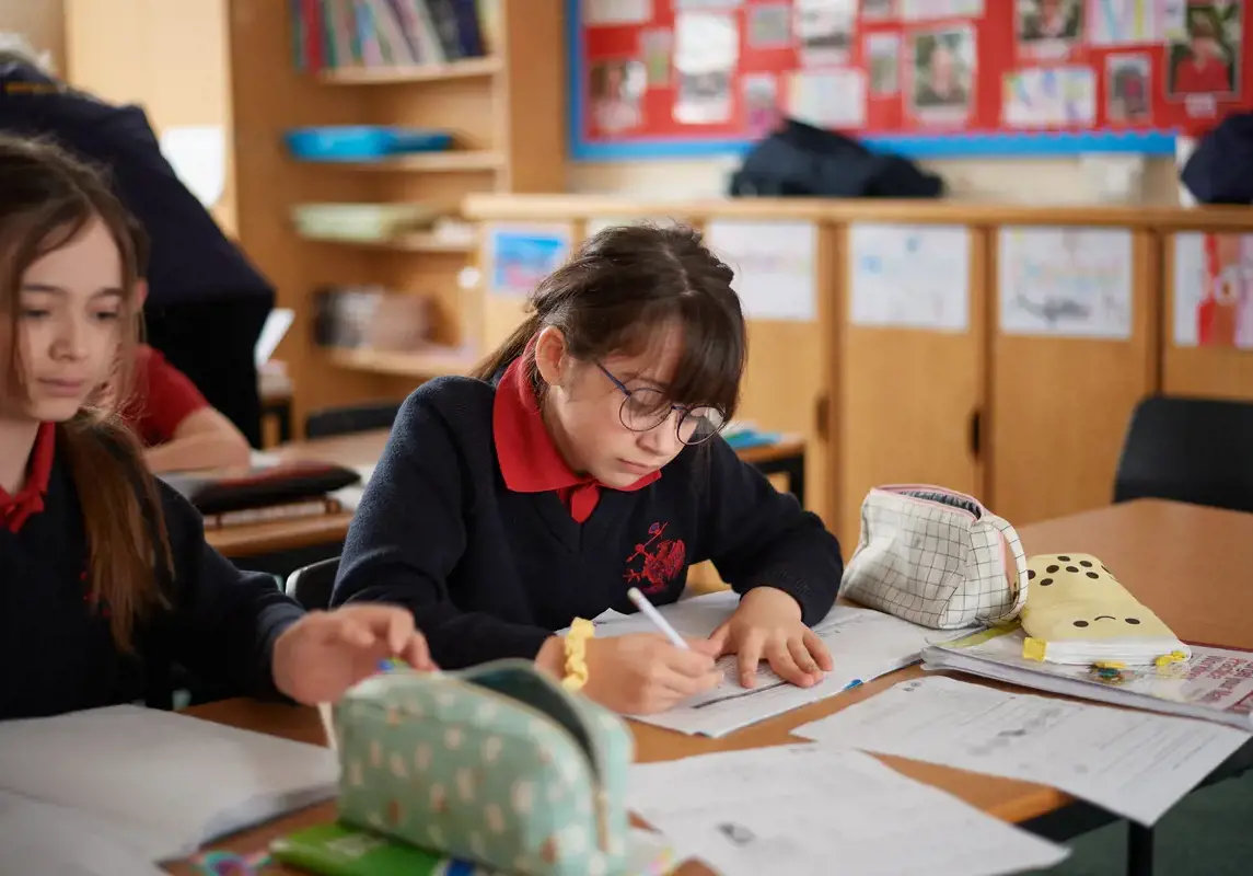 Girl studying in classroom