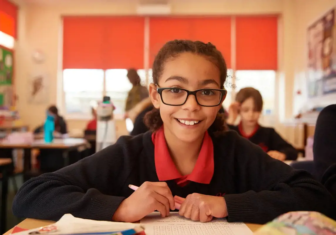 Happy girl in classroom