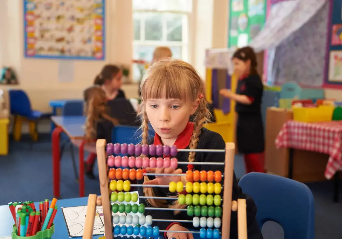 Pupil with abacus