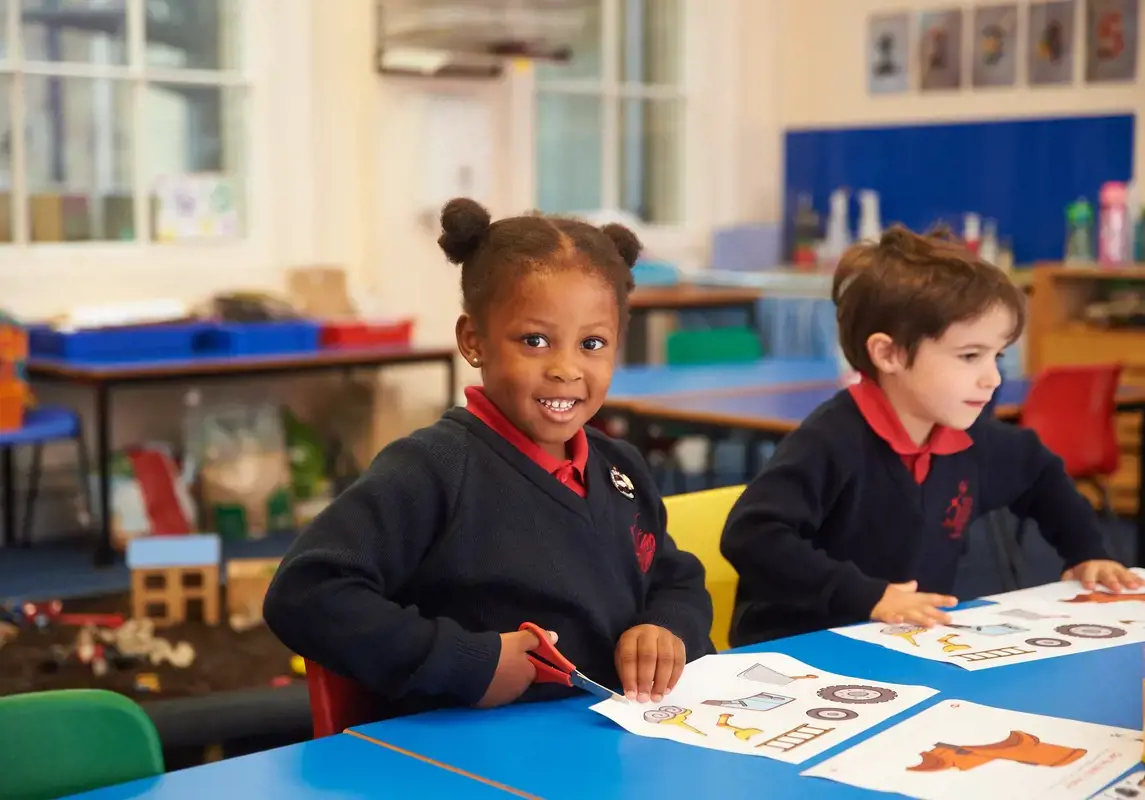 Nursery child with scissors