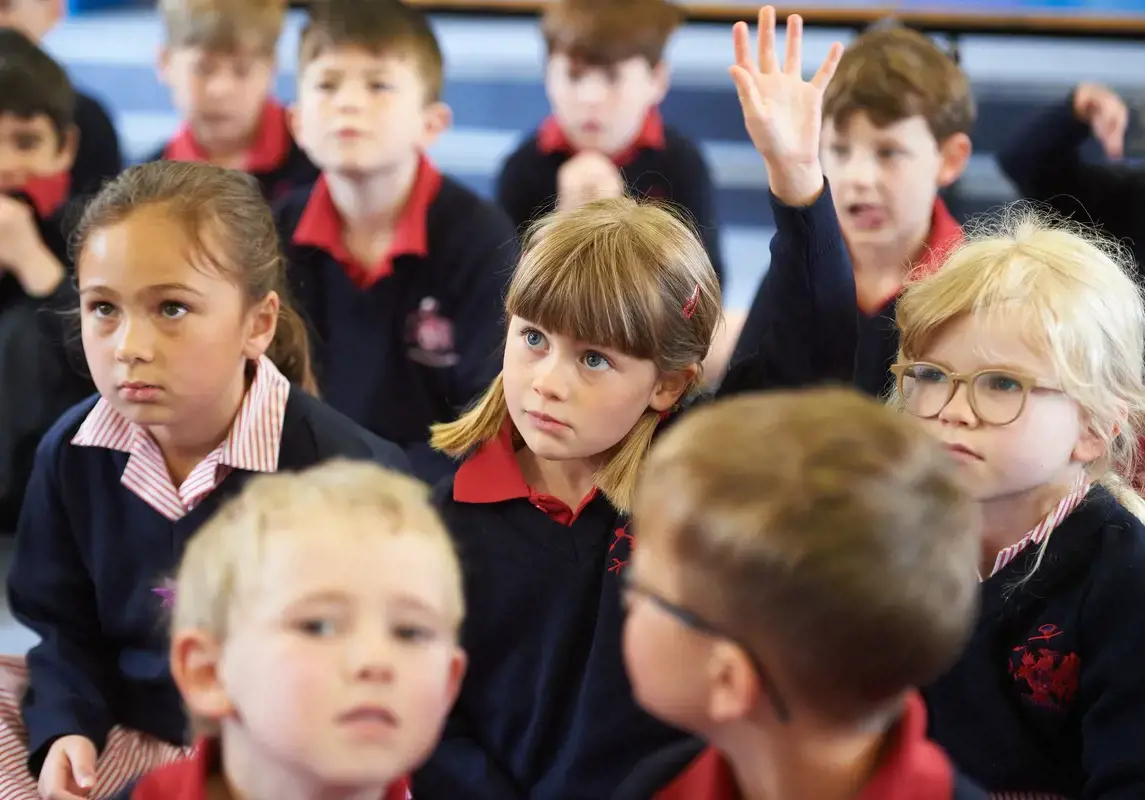 A group of young students in class