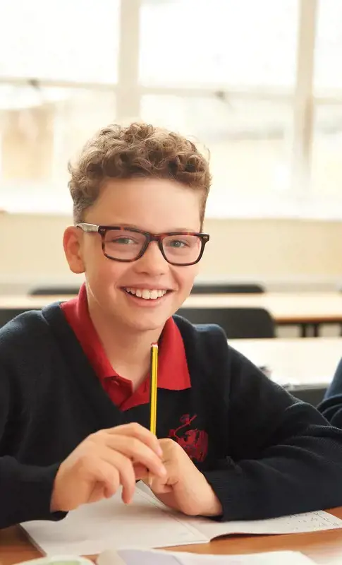 A happy student in class