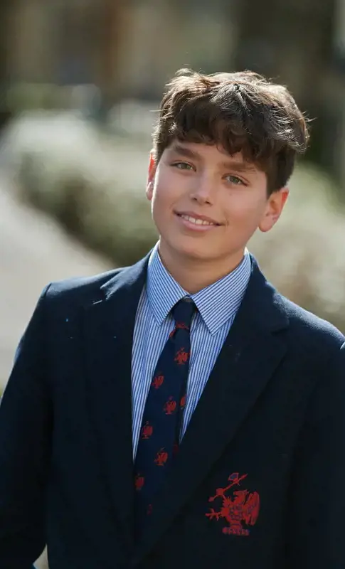 Student wearing Rendcomb College uniform