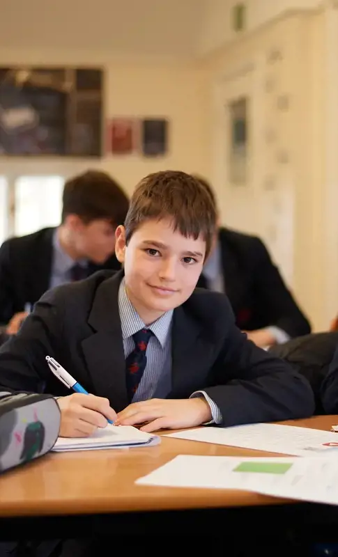 Student wearing Rendcomb College uniform