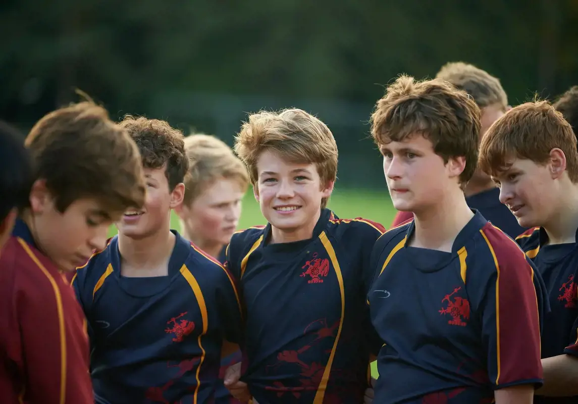 Students wearing Rendcomb College sports uniform