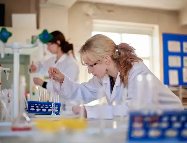 Rendcomb College Sixth Form pupil in science class