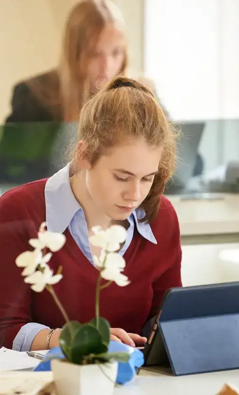 Sixth form student studying in class