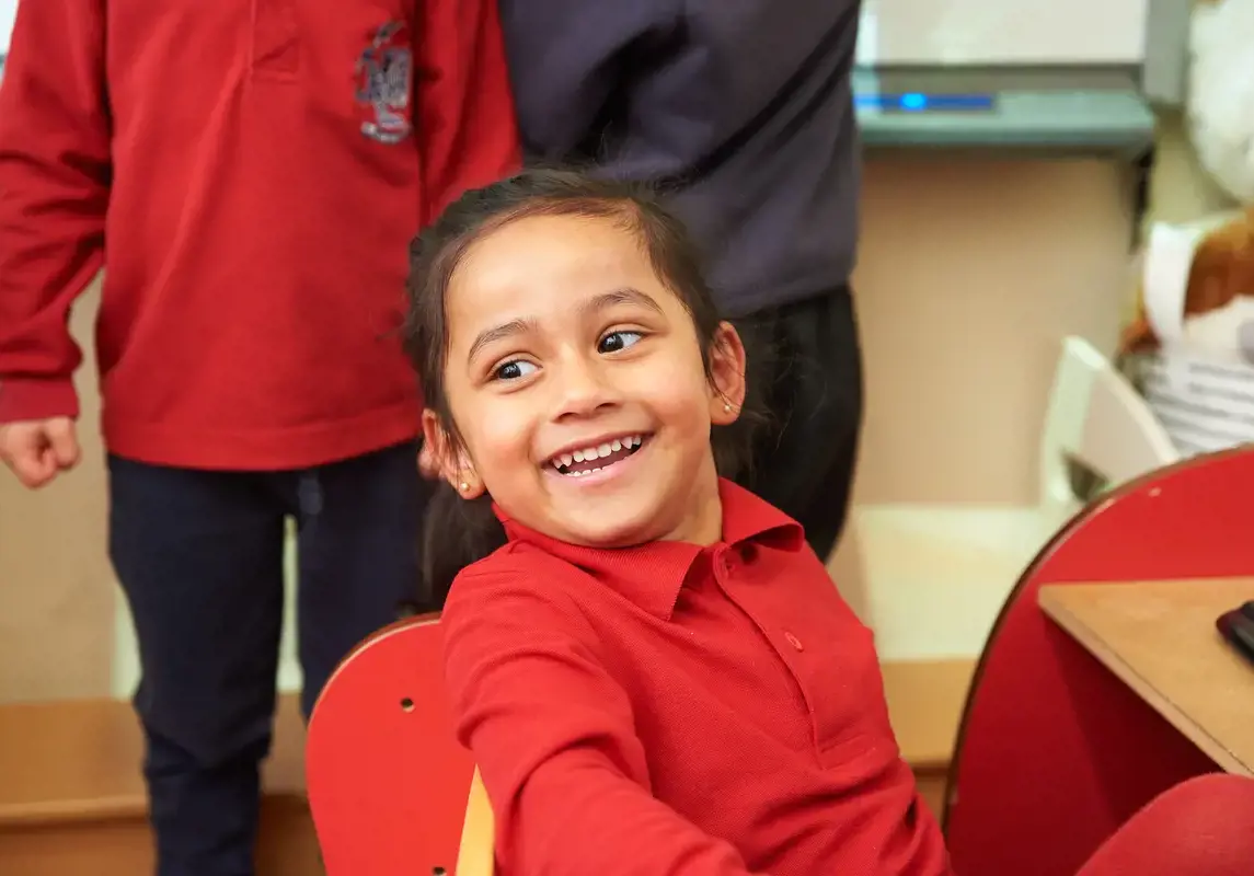 Smiling child in the nursery